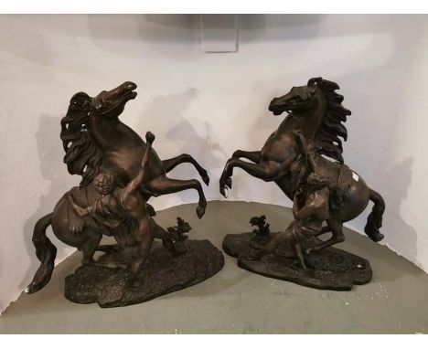 A pair of early 20th century bronze Marley horses. Each approximately: 35cm high, 35cm long and 12cm wide.The reigns are miss