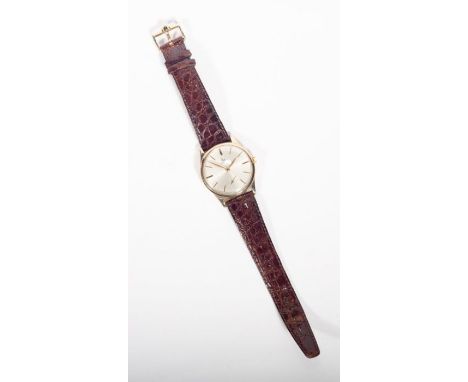A 9ct gold cased 1948 Omega mechanical movement watch on an Omega Crocodile leather strap. Watch movement serial number 11198