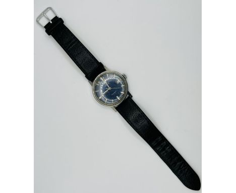 A Vintage Omega Geneve mechanical movement wristwatch. Navy blue dial with baton intervals and date window. Untested but appe