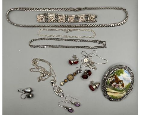 A selection of silver jewellery comprising a substantial hallmarked sterling silver snake chain (27.5 grams approximately); a