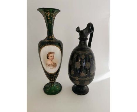 A Victorian green glass slender baluster vase applied with opaque profile portrait, gilt highlights, 36cm high and a Victoria