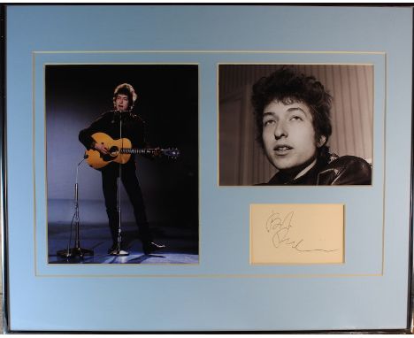 Bob Dylan signed presentation. A signed autograph book page Circa 1970’s. Signature in black ink. Framed and mounted with one