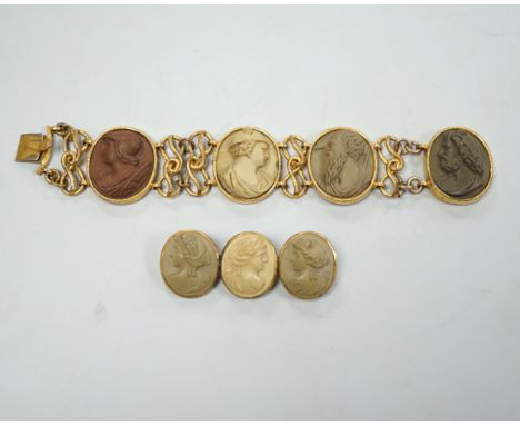 A 19th century gilt metal and oval lava panel set bracelet, 16.8cm and a similar brooch.***CONDITION REPORT***PLEASE NOTE:- P