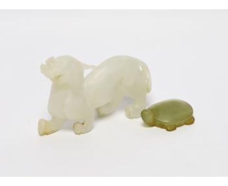 A 19th century Chinese jade model of a lion-dog, 9cm, together with a hardstone ‘tortoise’ pendant***CONDITION REPORT***PLEAS