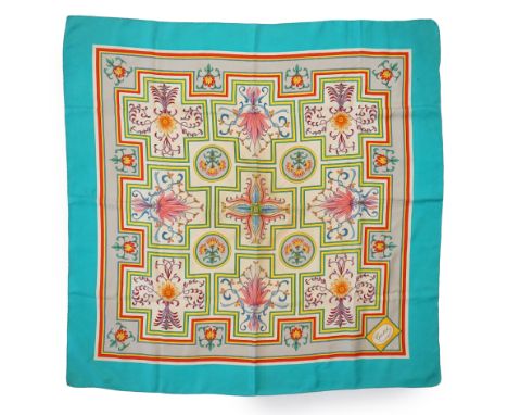 A Gucci Vittorio Accornero silk scarf, multicoloured floral design with light blue border, 88cm x 85cm***CONDITION REPORT***F
