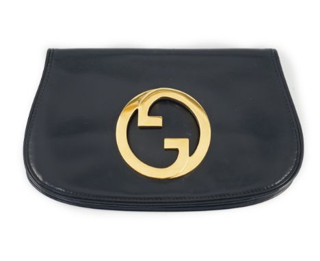 A vintage Gucci Blondie Unicorn navy leather clutch bag, Gold Gucci front logo, weighted closure, small internal pocket, leat