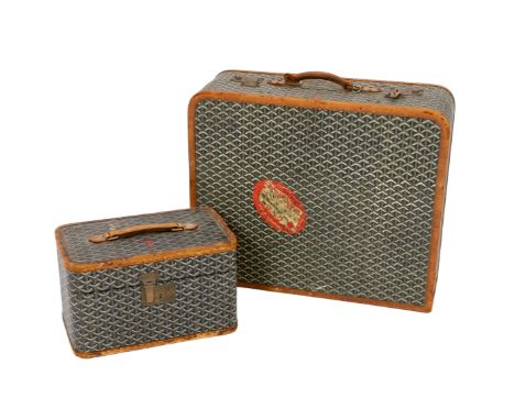 A 1940's Goyard vanity case with matching suitcase, each with tan leather mounts, the vanity case with internal tray and gold