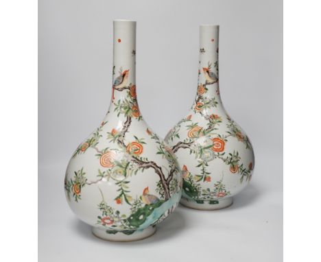 A pair of modern Chinese Kangxi style famille verte bottle vases, 40cm high***CONDITION REPORT***PLEASE NOTE:- Prospective bu