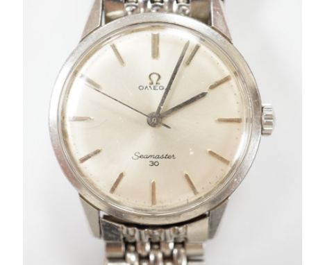 A gentleman's stainless steel Omega Seamaster 30 manual wind wrist watch, on a stainless steel Omega bracelet, case diameter 
