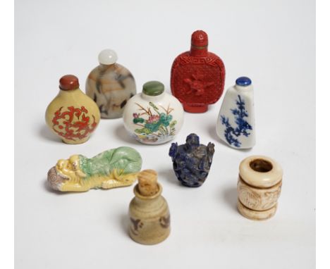 Seven various snuff bottles including simulated cinnabar lacquer, lapis lazuli, ceramic etc. together with a pottery vessel a