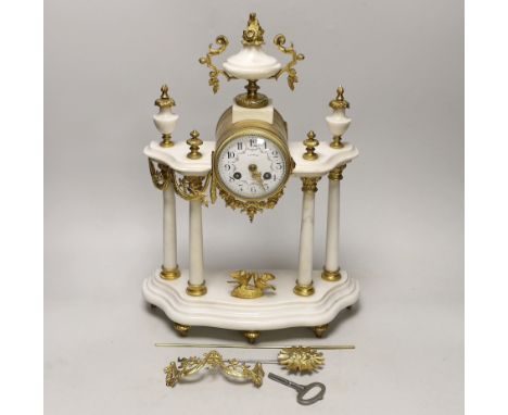 A 19th century French white marble mantel clock, 42cm***CONDITION REPORT***PLEASE NOTE:- Prospective buyers are strongly advi