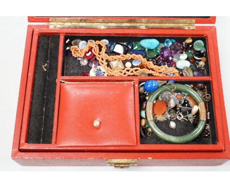 A box of assorted jewellery including loose stones, coral necklace, 9ct gold ring, a turquoise and seed pearl set yellow meta