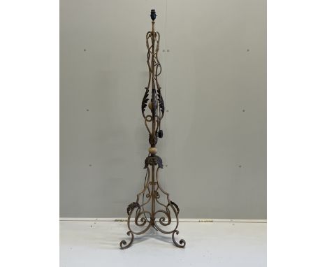 An early 20th century French wrought iron telescopic standard lamp***CONDITION REPORT***PLEASE NOTE:- Prospective buyers are 