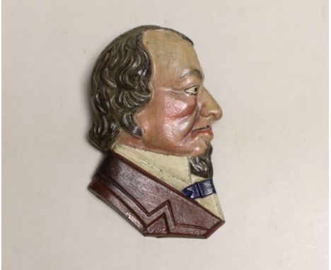 A painted iron Benjamin Disraeli plaque, 14cm high***CONDITION REPORT***PLEASE NOTE:- Prospective buyers are strongly advised