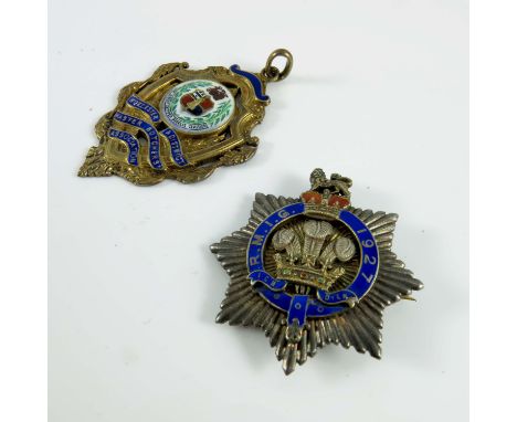 ENAMELLED SILVER GILT MEDAL 'WORCESTER AND DISTRICT MASTER BUTCHER'S ASSOCIATION' AND A SILVER R.M.I.G (ROYAL MASONIC INSTITU