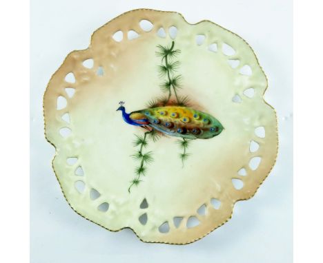 WORCESTER LOCKE AND CO PIERCED PLATE DECORATED WITH PEACOCKS SIGNED H.WALL,  APPROX. 22cms DIAMETER