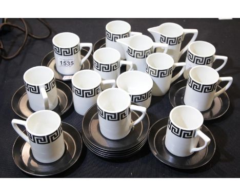 Portmeirion pottery designed by Susan Williams Ellis comprising eleven coffee cans and saucers, two cream jugs and a sugar bo