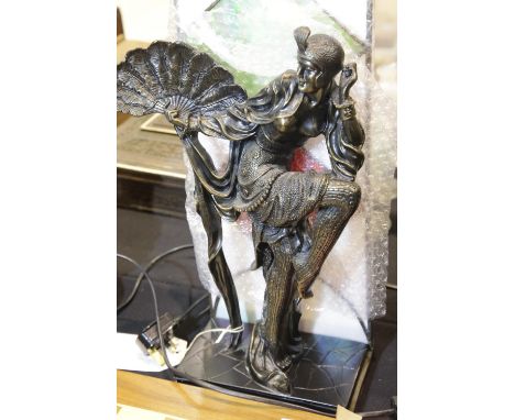 Heavy metal lamp with figurine to centre with glass panel shade, H: 44 cm. Not available for in-house P&amp;P 