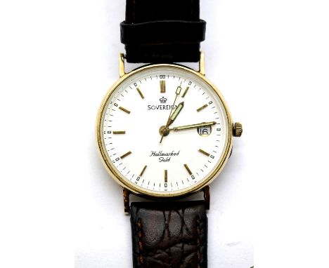 9ct gold sovereign wristwatch on a leather strap, verso lightly engraved, working at lotting, dial D: 30 mm. P&amp;P Group 1 