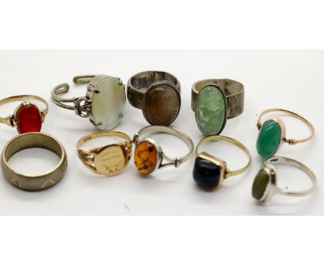 Ten mixed metal rings, different styles and sizes. P&amp;P Group 1 (£14+VAT for the first lot and £1+VAT for subsequent lots)