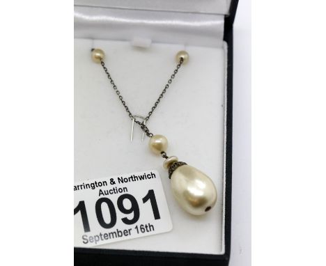 Boxed baroque pearl pendant on a silver chain. P&amp;P Group 1 (£14+VAT for the first lot and £1+VAT for subsequent lots) 