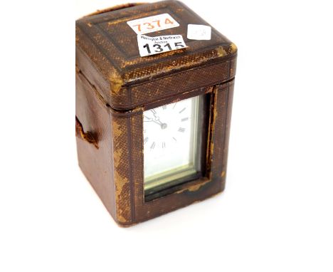 Cased large carriage clock in carry case by Thomas Russell and Son of Liverpool. P&P Group 3 (£25+VAT for the first lot and £