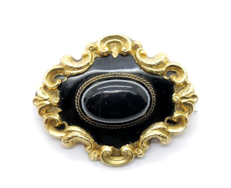 Victorian yellow metal mourning brooch with agate centre and vacant lock of hair panel to verso, L: 5 cm, 24g. P&amp;P Group 