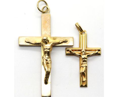 Two 9ct gold crucifix, 10.1g, largest L: 5 cm. P&amp;P Group 1 (£14+VAT for the first lot and £1+VAT for subsequent lots) 