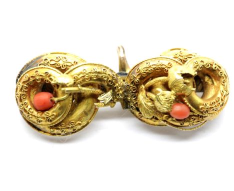 Yellow metal coral set brooch, 6.4g, W: 4.5 cm, no hallmarks. P&amp;P Group 1 (£14+VAT for the first lot and £1+VAT for subse