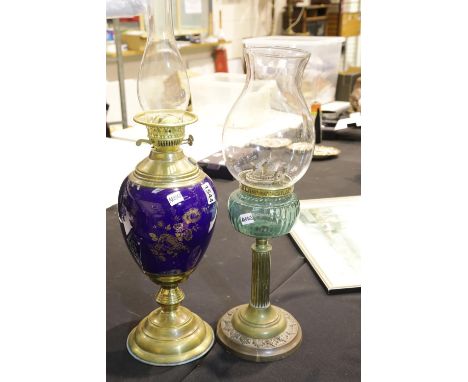 Ceramic and brass gilt decorated paraffin lamp plus another, tallest H: 70 cm. Not available for in-house P&amp;P 