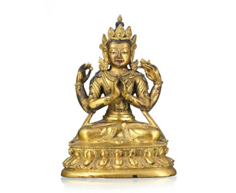 Divinité assise à quatre bras, sculpture en bronze doré, Tibet, XIX-XXe s., quelques reliquats de polychromie, sur un piédest