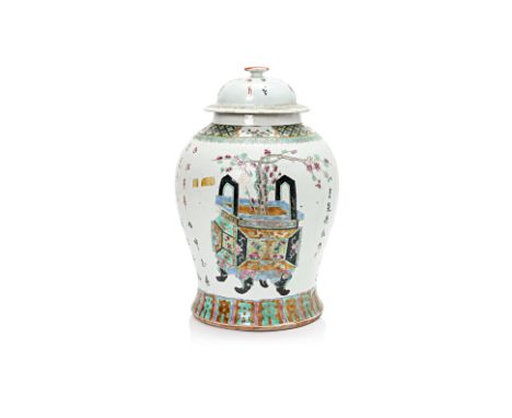 A FAMILLE ROSE PORCELAIN JAR AND COVER
Late 19th/early 20th Century, decorated in polychrome enamels with a large potted plan