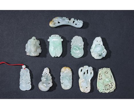 A GROUP OF TEN ASSORTED JADE CARVINGS AND PENDANTS
To include an example in the form of a belt hook; a cicada; a finger citro