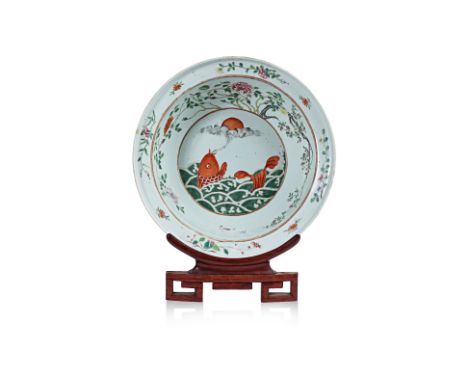 A LARGE FAMILLE ROSE PORCELAIN BASIN Decorated to the interior with central fish amongst crashing waves, within a broad borde