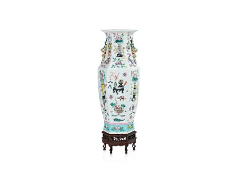 AN HEXAGONAL 'HUNDRED ANTIQUES' FAMILLE ROSE PORCELAIN VASE Moulded and polychrome enamelled with precious objects and auspic