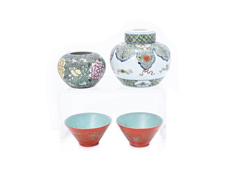 A GROUP OF PORCELAIN JARS AND TEA BOWLS
Comprising: a small doucai spherical jar and cover, decorated with Buddhist emblems a