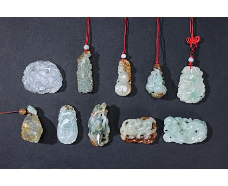 A GROUP OF TEN ASSORTED JADE CARVINGS AND PENDANTS
To include mythical creatures; bats with fruit; two squirrels; double gour
