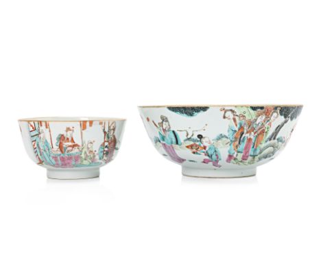 TWO FAMILLE ROSE PORCELAIN BOWLS Late 19th/early 20th Century, The larger, decorated with immortals beneath a pine tree in a 