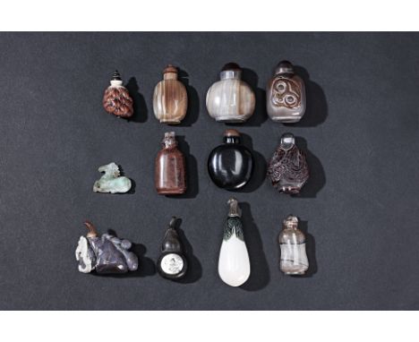 A MIXED GROUP OF HARDSTONE, GLASS AND OTHER SNUFF BOTTLES
To include several agate and hardstone examples, one carved with a 