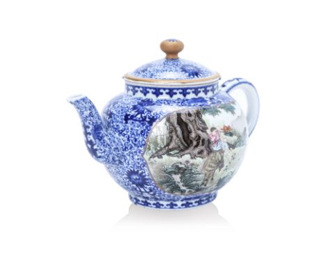 A FAMILLE ROSE AND UNDERGLAZE BLUE TEAPOT Decorated to one side with a boy and three goats resting beneath a tree, the revers