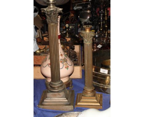 A brass Corinthian column table lamp, 20" high, and a smaller similar table lamp, 15" high