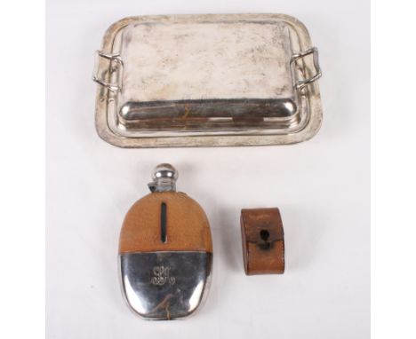 A silver plated entree dish and cover, a plated hip flask and a plated collapsible cup, in leather case