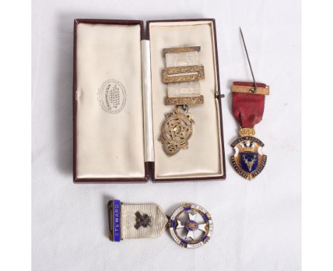 A Masonic silver gilt Royal Arch Companion breast jewel, in case, and two Masonic steward's badges