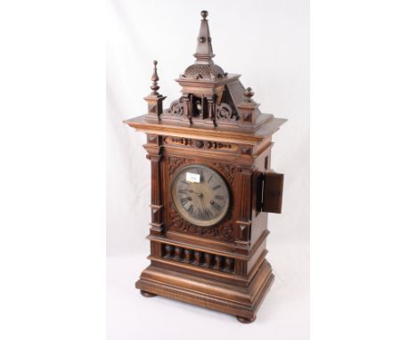 A late 19th Century Black Forest cuckoo clock in architectural design case with double fusee movement and musical box, 31" hi