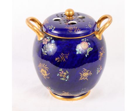 A 19th Century Spode two-handled pot-pourri vase decorated flowers in colours and gilt, 10" high