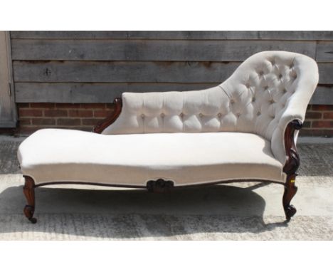 A mid 19th Century rosewood chaise longue, button upholstered in a mushroom dralon, on cabriole supports