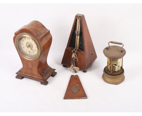 A 19th Century ebonised and boulle work mantel clock with eight-day striking movement (for restoration), an Edwardian walnut 