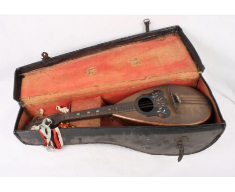 A Neapolitan rosewood mandolin, in case