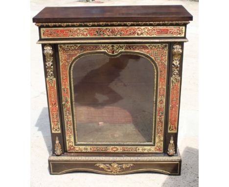 A 19th Century ebonised boulle side cabinet enclosed arched glazed panel door, gilt metal mounts, 34 1/2" wide