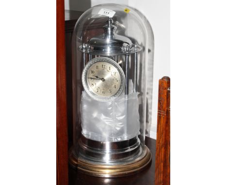 A chromed 400-day clock under glass dome, 17" high, and a Victorian black slate cased mantel clock inset marble panels, 12" h